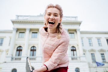 education, school, college, study abroad concept - smiling happy laughing student girl with polka...