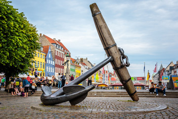 Ship anchor and colorful houses at the Nyhavn canal in Copenhagen, Denmark