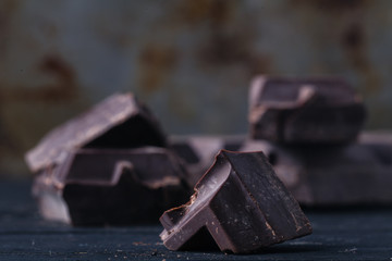 Crunch dark chocolat on rustic table