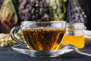 folk medicine with honey and healing herbs concept