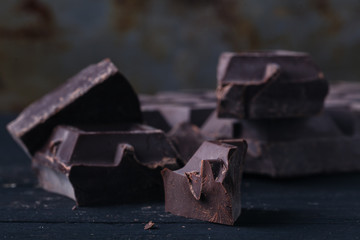 Close up dark chocolate on rustic table