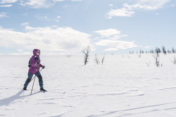 A girl out skiing