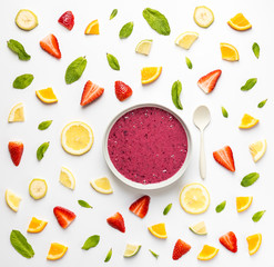 Smoothie bowl in layout of fruit