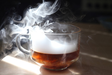 mug with smoke on a table