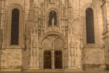 Facade of the Jeronimos (Hieronymites) Monastery in the Belem district of Lisbon illuminated at night
