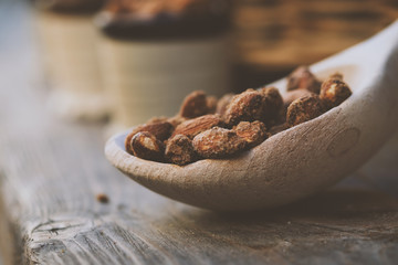 Wood spoon with almond nuts - natural food