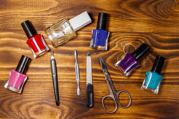 Obraz premium Basic set of manicure tools on wooden background