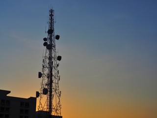 The silhouette of the big antenna in the concept of wireless communication technology from radio waves. Satellite