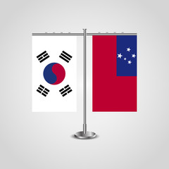 Table stand with flags of South Korea and Samoa.Two flag. Flag pole. Symbolizing the cooperation between the two countries. Table flags