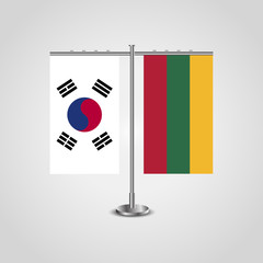 Table stand with flags of South Korea and Lithuania.Two flag. Flag pole. Symbolizing the cooperation between the two countries. Table flags