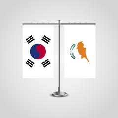 Table stand with flags of South Korea and Cyprus.Two flag. Flag pole. Symbolizing the cooperation between the two countries. Table flags