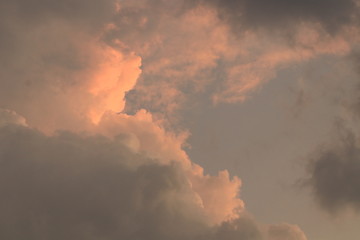 The orange light and clouds in the evening