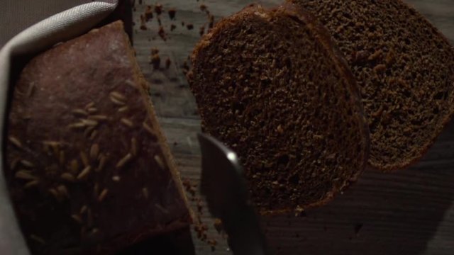 A piece of bread falls on its side.