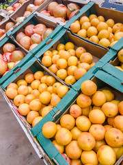 Fruit market with various colorful fresh fruits and vegetables