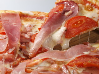 European cuisine Italian pizza with bacon and tomatoes