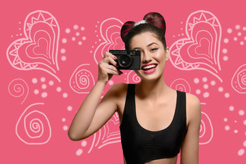 Young beatiful girl, wearing black short top, original hairstyle and bright make up taking photo for pop art image. Feeling happy, having nice smile. Pink background with white hearts.