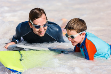 Father and son boogie boarding