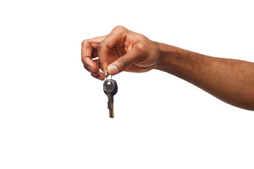 Black male hand holding key to your dream