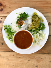 Rice vermicelli served with curry and vegetable