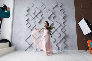 professional photography studio showing behind the scenes lights on bride model