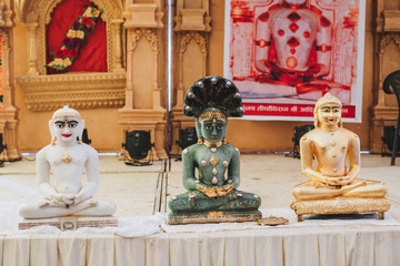 monastery altar with deities of Padmasambhava, Buddha in India