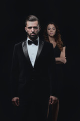 gentleman with his girl posing in the studio