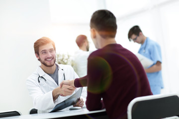 Fototapeta premium handshake between doctor and patient