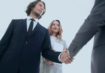Photo of handshake of two happy businessmen