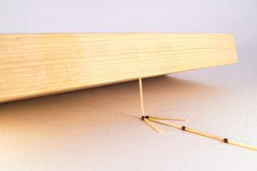 A thin match and a massive board, as an example of using the weak element at the right place to...
