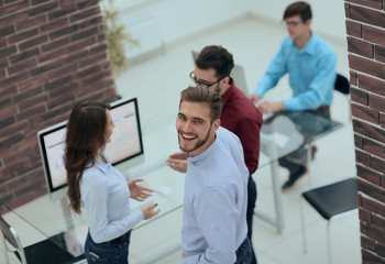 Business people discuss something at the meeting at the modern o