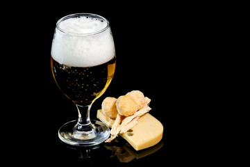 Glass of fresh beer with cheese and cheese  spheres and kalmar © filosofff