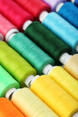 Fototapeta na wymiar Background of colourful thread spools