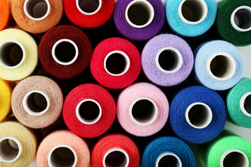 Background of colourful thread spools