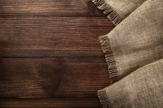 Sackcloth texture on brown wooden table