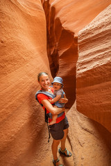 A mother and her baby son visit Lower Antelope canyon in Arizona