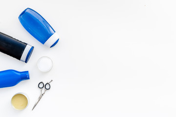 Men's bathroom set. Cosmetics and tools for body and hair care on white background top view space for text