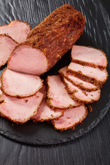close-up of tasty spiced sliced smoked ham