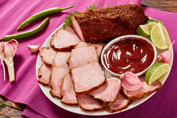 sliced ham on a white plate