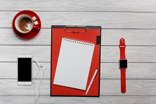 white desktop red cup coffee clock clock phone phone headphones
