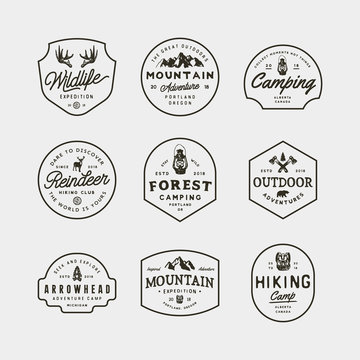 set of vintage wilderness logos. hand drawn retro styled outdoor adventure emblems. vector illustration