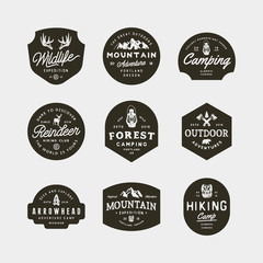 set of vintage wilderness logos. hand drawn retro styled outdoor adventure emblems. vector illustration