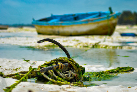 Boat behind anchor