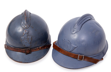 two french military helmet of the First World War on white background