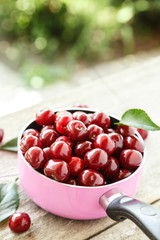 ripe cherries in a pan