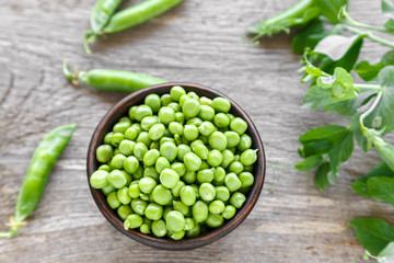 Fresh green peas in a plate