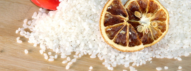 Cooking with rice, peppers and orange