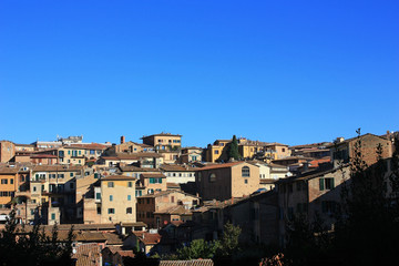 Fototapeta premium Medieval houses in Siena, Italy