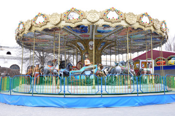 Carnival carouselle in empty early spring park
