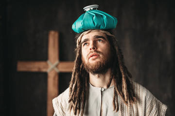 Jesus Christ with a heating pad on his head