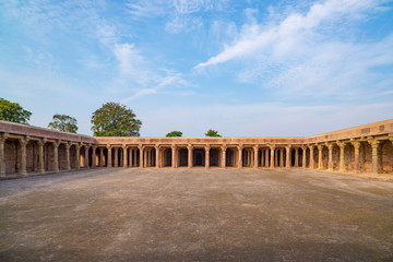 Mandu India, afghan ruins of islam kingdom, mosque monument and muslim tomb. View through door,...